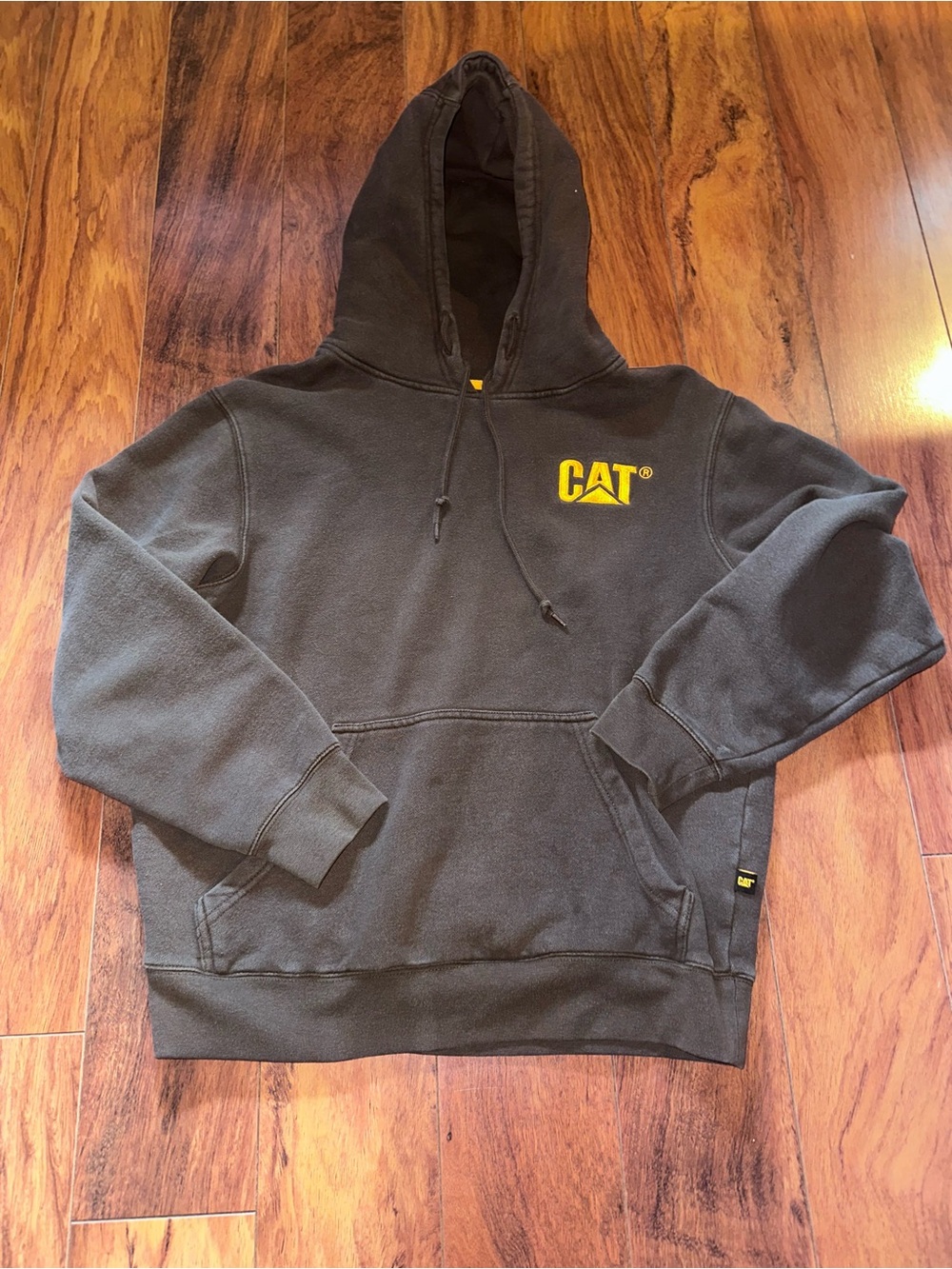 CAT Men's Black Pullover Hoodie with Yellow Logo